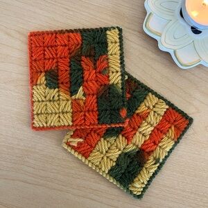 Pair of 1970s knitted coasters